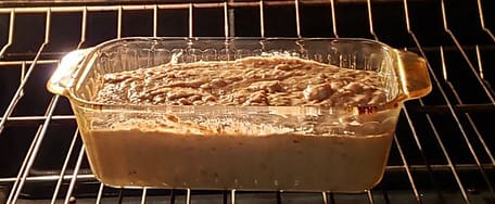 Fiber-rich banana bread batter in a loaf pan in the oven
