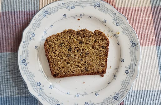 A slice of fiber-rich banana bread on a plate